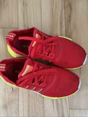 Adidas NMD ladies sz 6 Red Sneakers with Yellow Accents